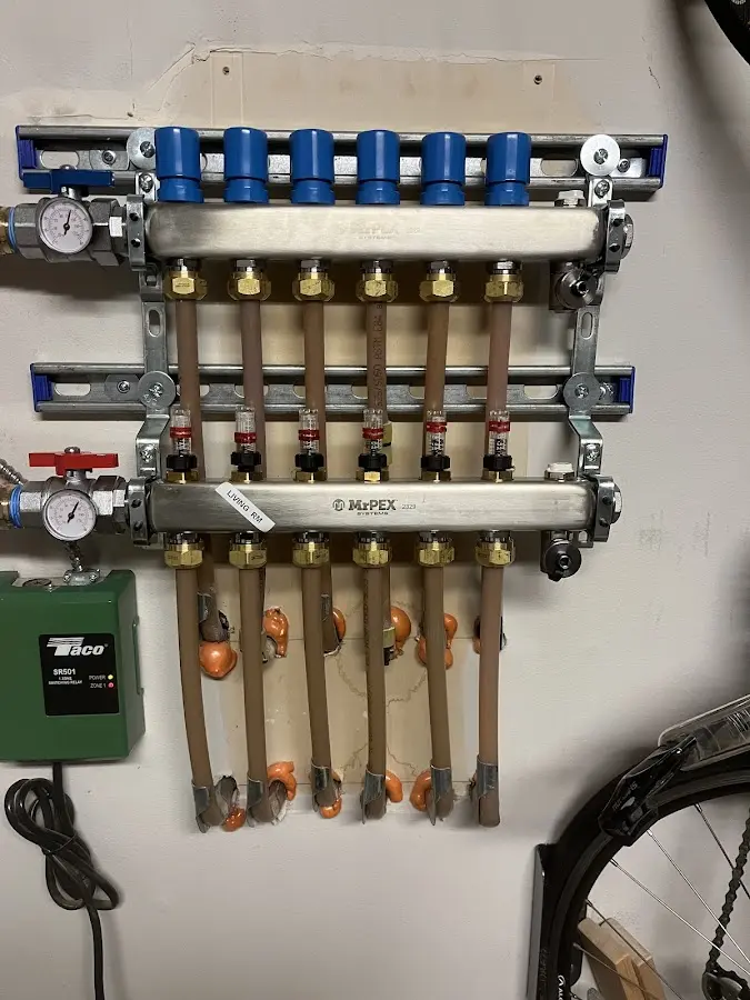 Plumber performing Leak Detection at a residential property in Wyandotte